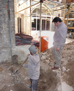 Photo of Alireza Sadeghian on the jobsite of a restoration project